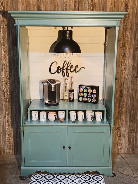 The Coffee Bar Is Set Up With Cups On It