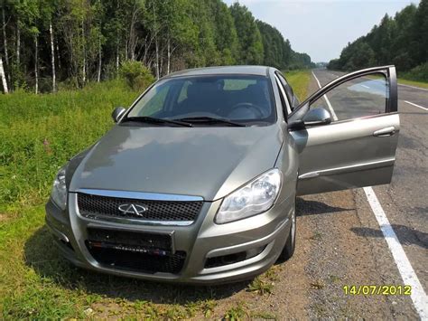 Чери М11 12 года, цвет кузова серо-зеленый металлик, комплектация basik ...