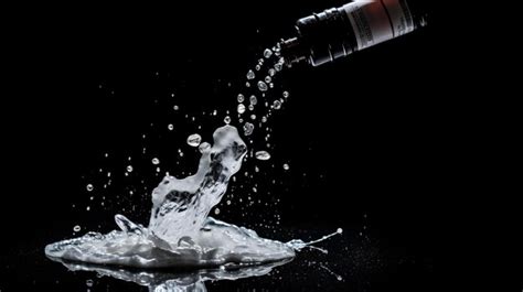 Premium AI Image | painkiller spills from bottle on black background
