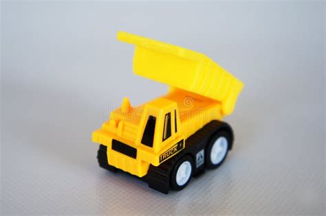 Selective Focused on Yellow Toy Dump Truck Made from Plastic. Stock ...