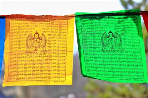 Premium Photo Close Up Of Prayer Flag Hanging Outdoors