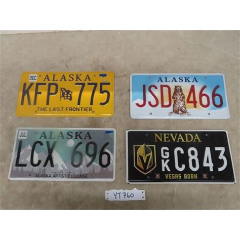 Nevada Plate With Golden Knights Logo And 3 Alaska License Plates