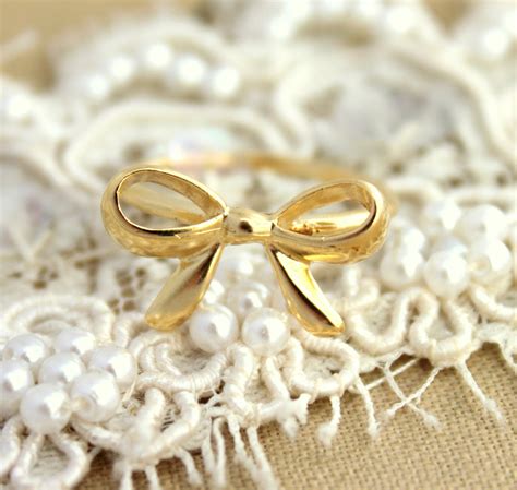 Gold bow ring 14 k goldfield