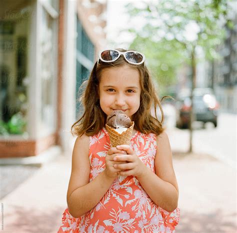 Cute Young Girl Excited To Eat A Big Ice Cream By Stocksy Contributor