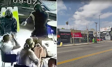 Shocking Moment Diners Are Robbed At Gunpoint In Broad Daylight At