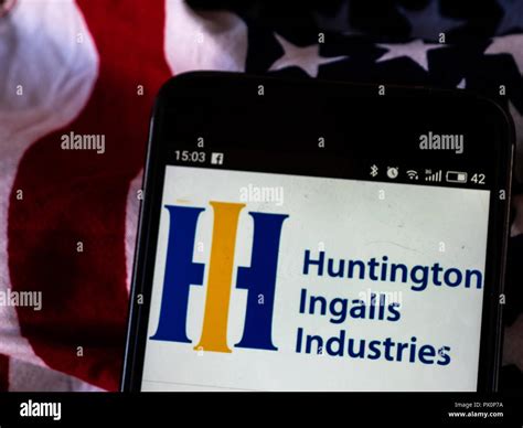 Huntington Ingalls Industries logo seen displayed on smart phone ...