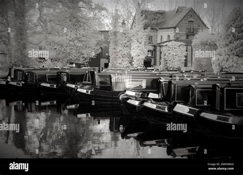 Sepia Tone Black And White Photograph Of Narrowboats On The Waterways Of Staffordshire Sepia