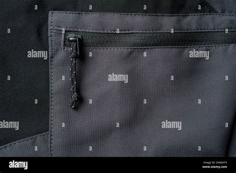 Drawstring Zipper Of Dark Gray Outdoor Trouser Pocket Stock Photo Alamy