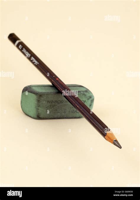 Pencil And Green Eraser Stock Photo Alamy