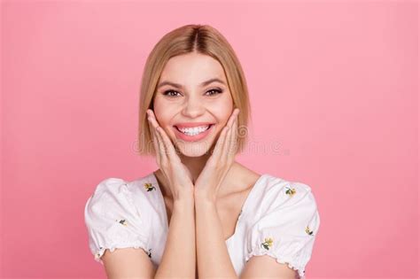 Portrait Of Young Optimistic Cute Lady Wear White Blouse Touch Cheeks