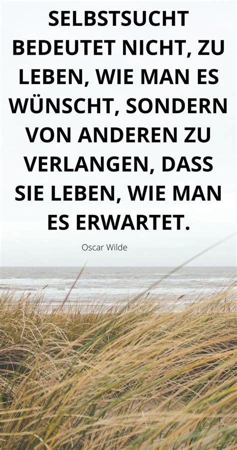 An Image With The Words In German On It And Grass By The Beach Below