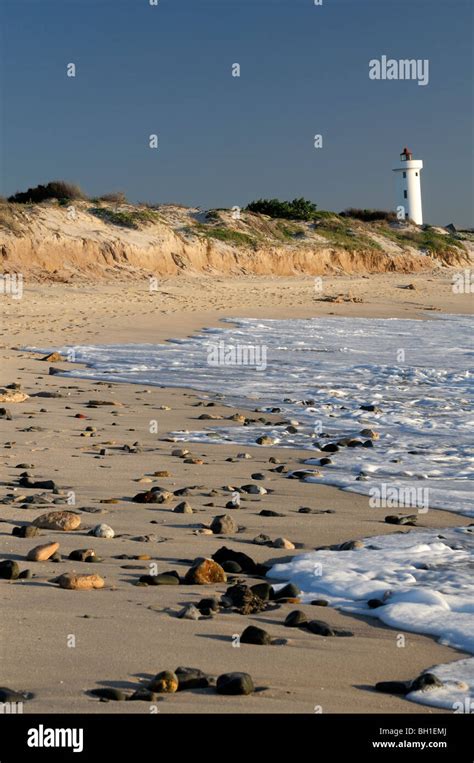 milnerton lighthouse and beach at dusk cape town south africa Stock ...