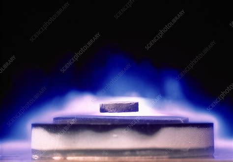 Magnetic levitation of superconductor - Stock Image - A250/0032 - Science Photo Library