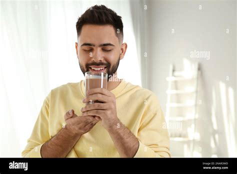 Man drinking milkshake hi-res stock photography and images - Alamy