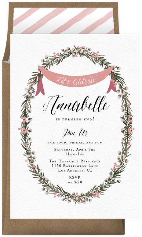 A Wedding Card With An Elegant Wreath Design