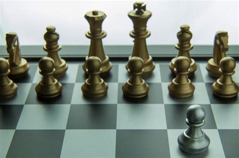 Premium Photo | Gold and silver chess on board