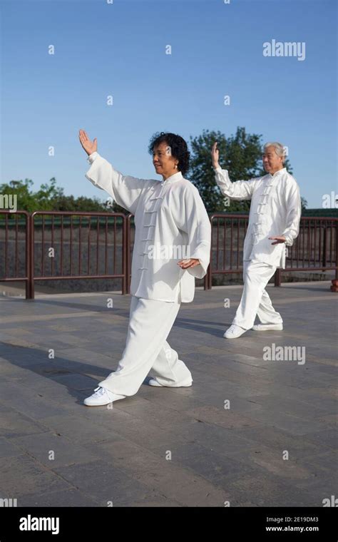 Two old people playing Tai Chi in the park high quality photo Stock ...