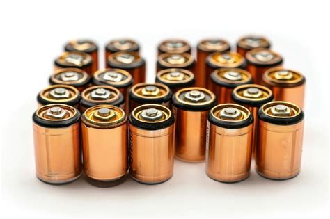 Batteries On White Background Premium AI Generated Image