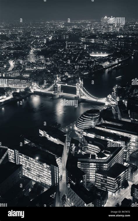 London Aerial View Panorama At Night With Urban Architectures And Tower