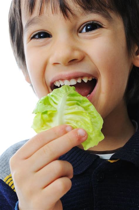 Kid eating salad stock photo. Image of lettuce, health - 13008504