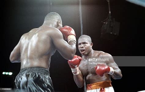 Donovan Ruddock looks to land a punch against Mike Tyson during the ...