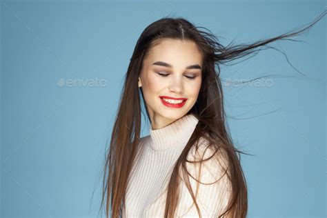 Brunette In A White Sweater Red Lips Charm Long Hair Blue Background
