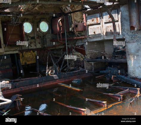 Wrecked abandoned ship interior on a river after nuclear disaster in ...