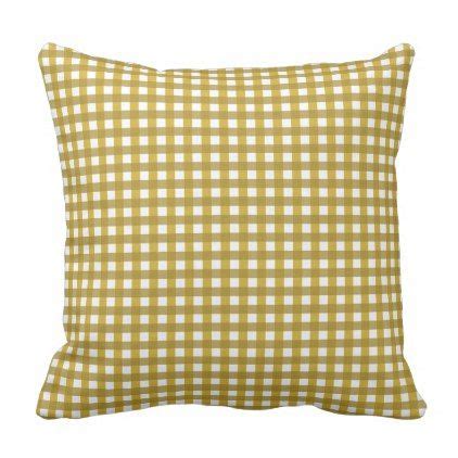 A Yellow And White Checkered Pillow On A White Background