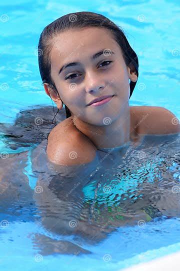 Girl Smiling In A Swimming Pool Stock Image Image Of Cute Childhood