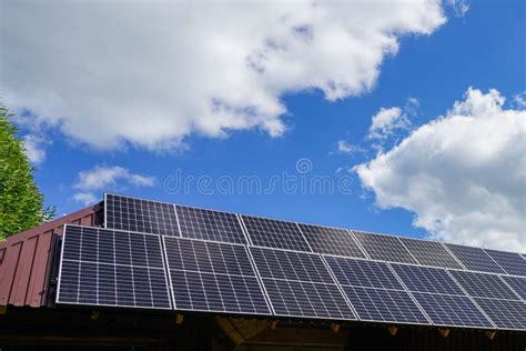 Many Photovoltaic Solar Panels Mounted On Wooden House Roof Roof Of