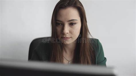 Brunette Woman Is Working In Front Of A Monitor In A Office Business Woman Working At Computer