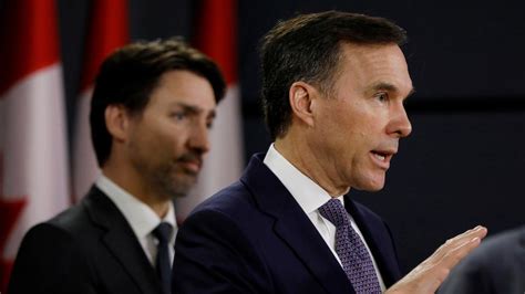 charity scandal trudeaus finance minister admits  travel gift