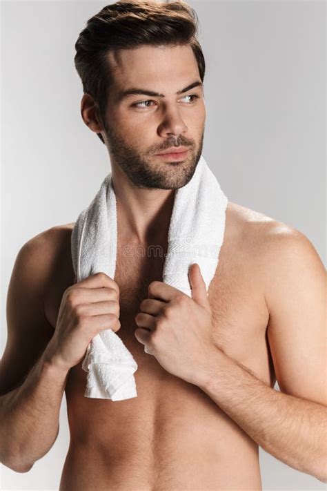 An Athletic Half Naked Man Boxer Training In The Studio In Front Of The