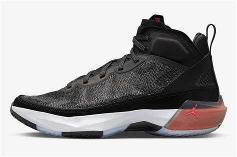 Air Jordan Available In Black And Hot Punch Sneakers Cartel