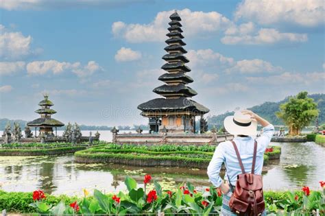 Woman Traveler At Pura Ulun Danu Beratan Bedugul Temple On A Lake In