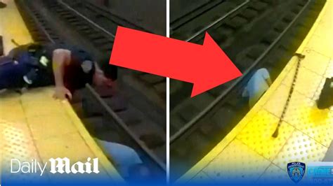 Dramatic Moment Heroic Police Officers Rescue Man Collapsed On Subway