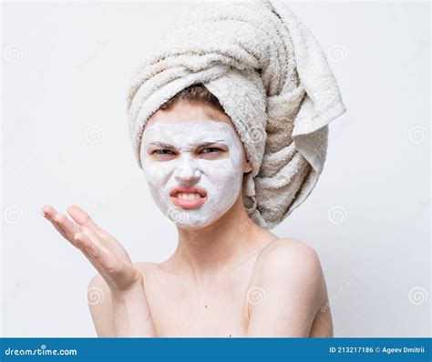 Happy Woman With White Mask On Her Face Naked Shoulders Clean Skin Towel On Head Stock Photo