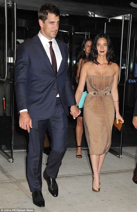 Olivia Munn Highlights Tiny Waist With Cinched Nude Pencil Dress As She