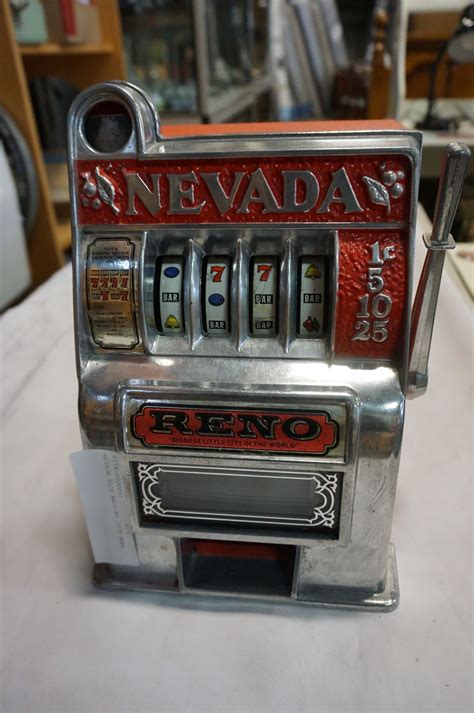 NEVADA SLOT MACHINE COIN BANK - Big Valley Auction