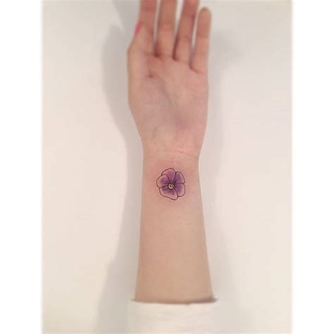 Illustrative Style Pansy Tattoo Located On The Wrist