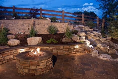 Using A Stone Feature In A Garden Solé Structural Landscapes