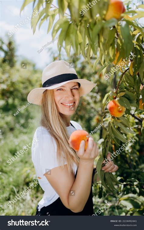 Pleasant Mature Woman Blond Hair Smiling Stock Photo