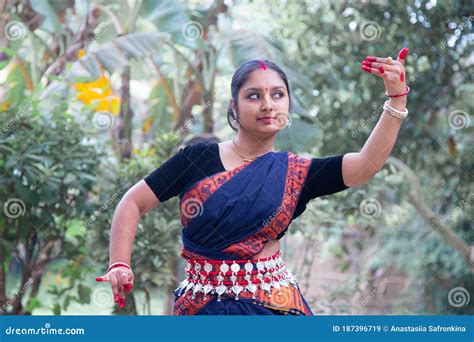 Portrait Of Beautiful Young Indian Classical Odissi Dancer Wears Traditional Costume And Posing ...