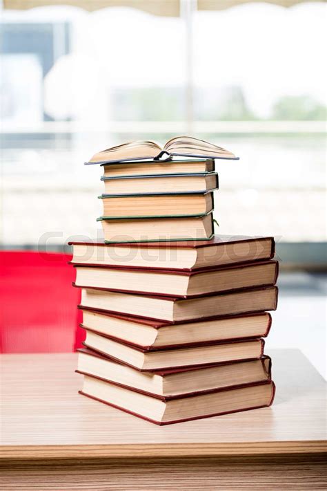 Stack Of Books Arranged The Office Desk Stock Image Colourbox