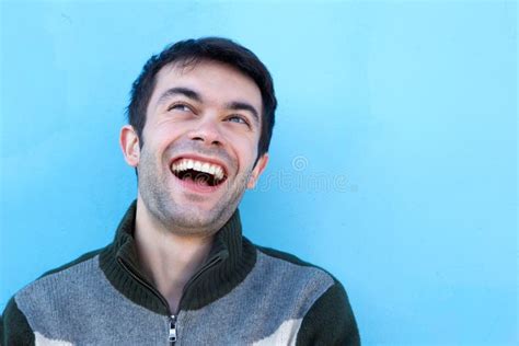 Close Up Face Portrait Of A Young Man Laughing Stock Photo Image Of