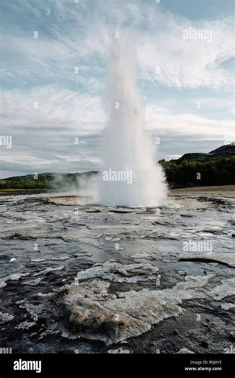 Strokkur In The Popular Tourist Destination Of Geysir Hot Spring In The