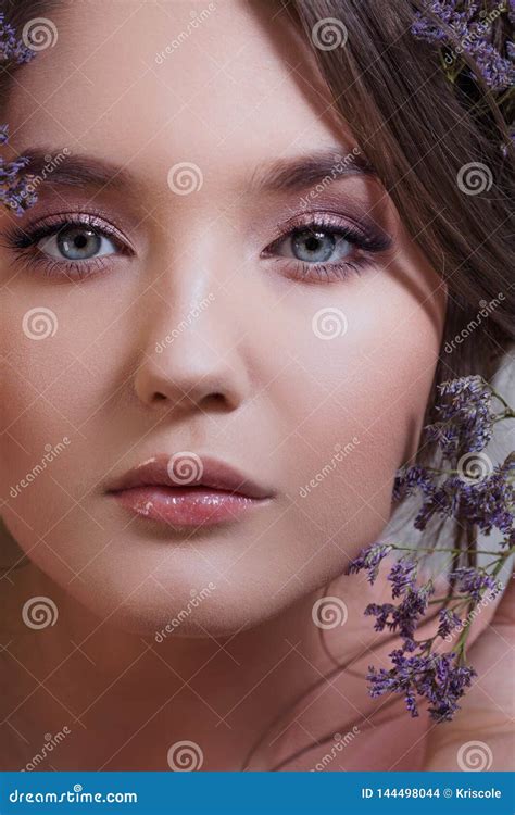 Attractive Blue Eyed Brunette With A Gentle Spring Image Stock Photo