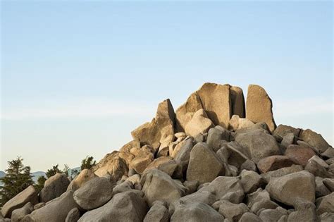 Premium AI Image | a large rock formation is in the background.