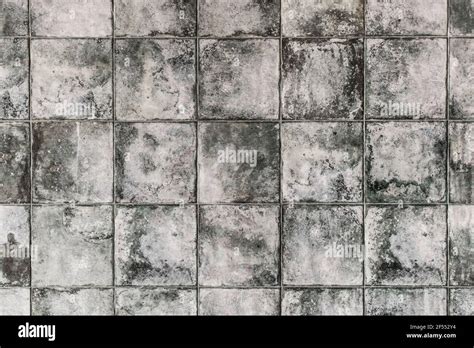 Dark gray square ceramic floor tiles with abstract pattern, mosaic