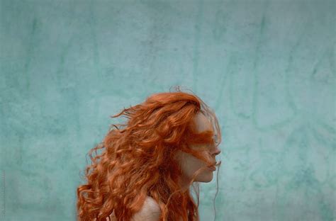 Redhead And Blue Wall With Copyspace By Stocksy Contributor Sonja Lekovic Stocksy